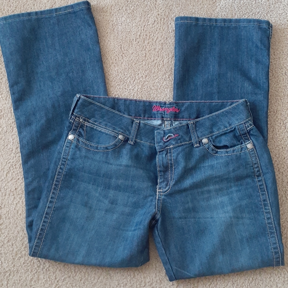 Wrangler jeans! Super cute with pink stitching! They are a little shiny too.